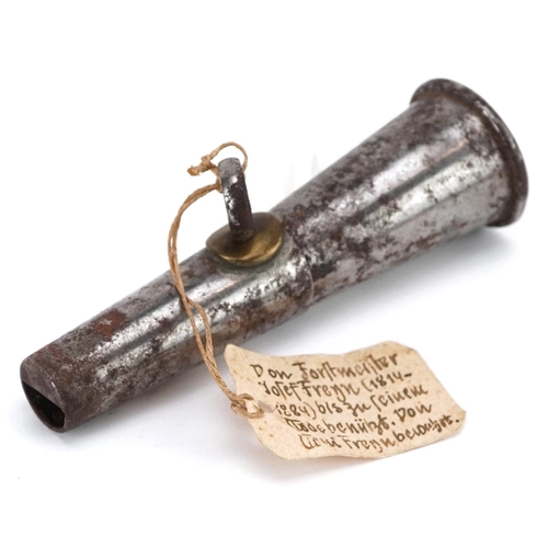 406 - An unusual steel portable hunting horn, circa 1850, with an attached label in German, apparently ide... 