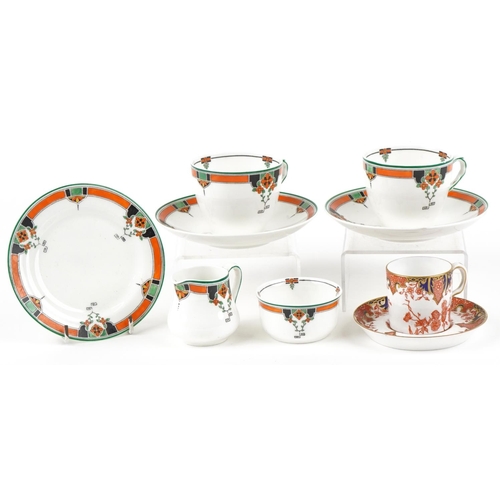 423 - An Royal Doulton Art Deco part tea set comprising two cups with saucers, milk jug, sugar bowl and si... 