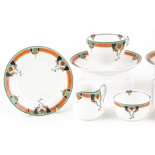 423 - An Royal Doulton Art Deco part tea set comprising two cups with saucers, milk jug, sugar bowl and si... 