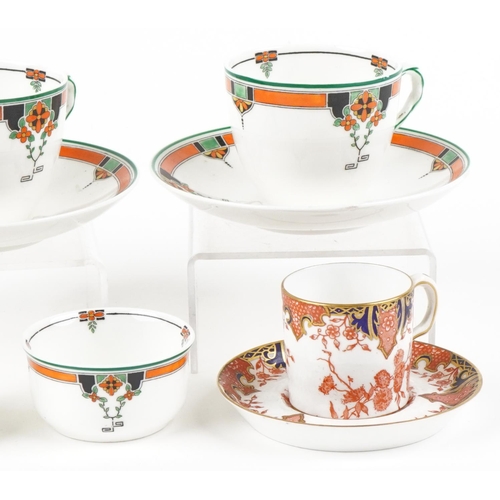 423 - An Royal Doulton Art Deco part tea set comprising two cups with saucers, milk jug, sugar bowl and si... 