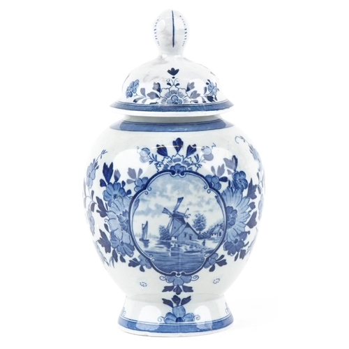 1197 - A 20th century Dutch Delft blue and white vase and cover, 26cm high.