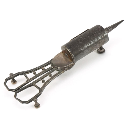 561 - A pair of Georgian silver and steel candle snuffers, indistinct hallmarks, 16cm in length, 130.0g.