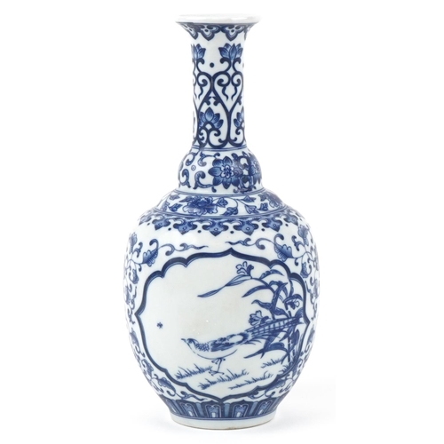 136 - A Chinese porcelain blue and white vase hand painted with cranes and birds of paradise amongst folia... 