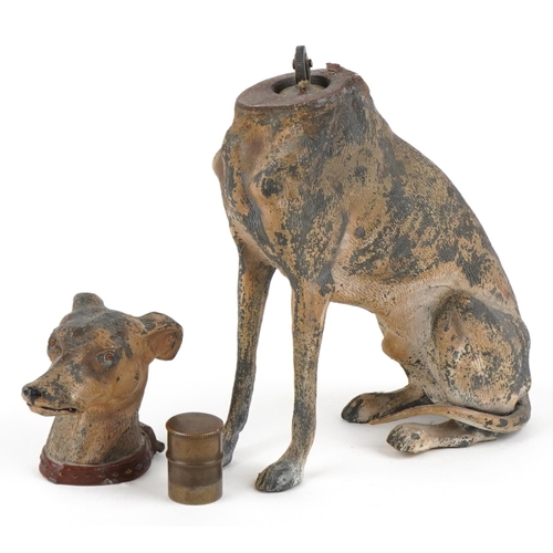 9 - A novelty cold painted spelter table lighter in the form of a seated Greyhound, 16.5cm high.