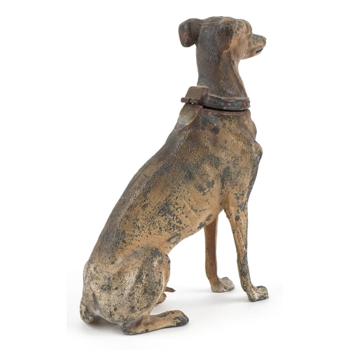 9 - A novelty cold painted spelter table lighter in the form of a seated Greyhound, 16.5cm high.