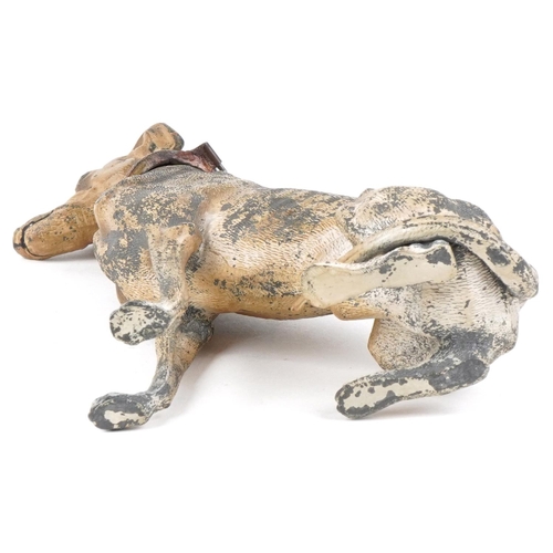 9 - A novelty cold painted spelter table lighter in the form of a seated Greyhound, 16.5cm high.