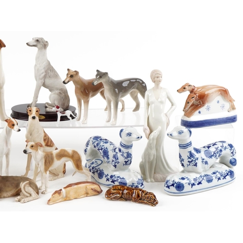 1138 - A collection of porcelain, pottery and resin models of Greyhounds, the largest 30cm in length.