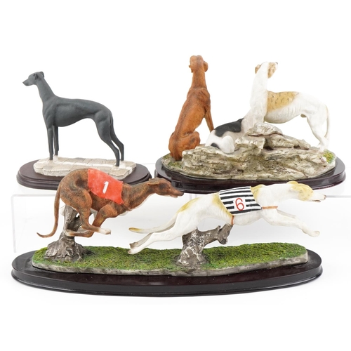 1152 - Three decorative resin sculptures of Greyhounds including a Juliana Collection, the largest 50cm wid... 