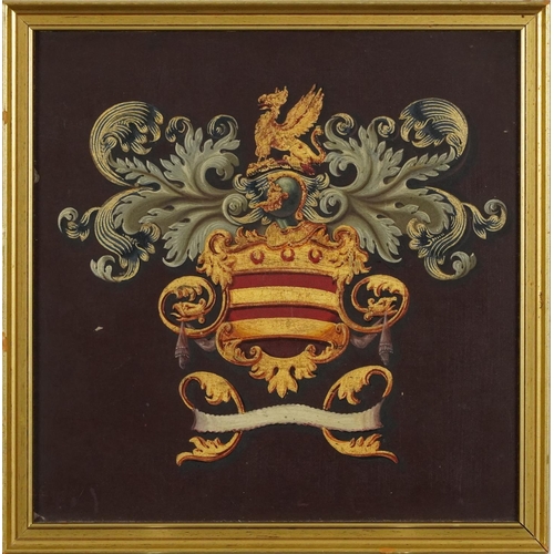 1535 - A papier-mâché painted armorial device on a coach panel, 19th century, on a maroon ground, framed, 2... 