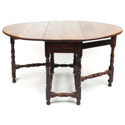 2052 - An 18th century oak gateleg table, 75cm high x 113cm wide, together with a pair of 18th century oak ... 