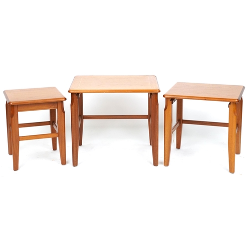 2011 - A late 20th century Legate teak nest of three occasional tables, 50cm H x 56cm W x 46cm D.