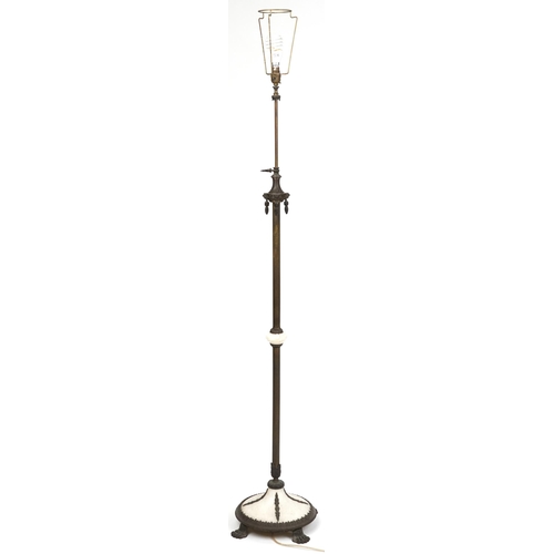 2008 - A 20th century Neo-Classical Revival alabaster and brown patinated metal adjustable lamp standard on... 