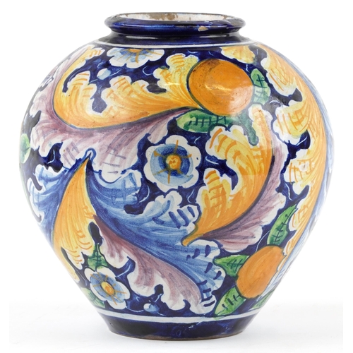 281 - A 19th century Venetian Majolica pharmacy vase hand painted with scrolling flowers, 23cm high.