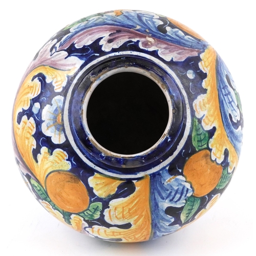 281 - A 19th century Venetian Majolica pharmacy vase hand painted with scrolling flowers, 23cm high.