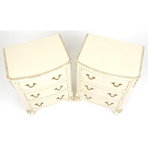 2042 - A pair of mid 20th century Italianate bedside chests of three drawers, 73cm H x 47cm W x 38cm D.