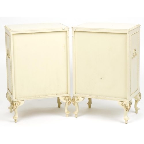 2042 - A pair of mid 20th century Italianate bedside chests of three drawers, 73cm H x 47cm W x 38cm D.