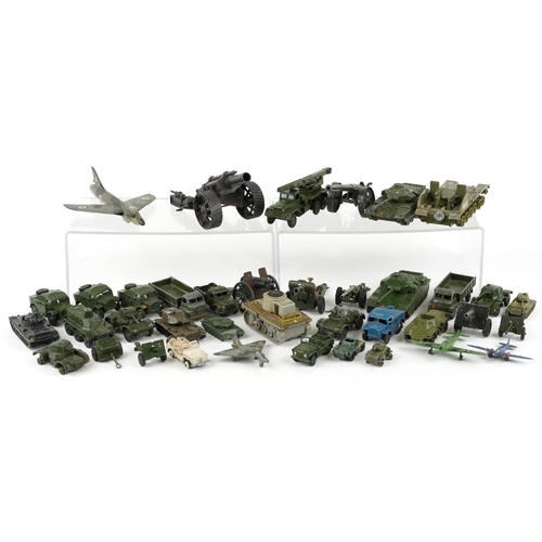 1329 - A collection of vintage military vehicles, predominantly diecast including Dinky examples.