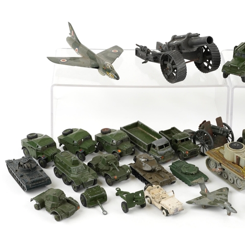 1329 - A collection of vintage military vehicles, predominantly diecast including Dinky examples.