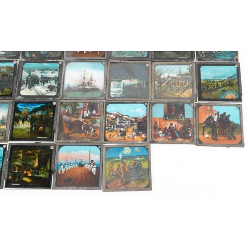 2440 - A collection of vintage coloured magic lantern slides, some military interest, including Throwing Gr... 