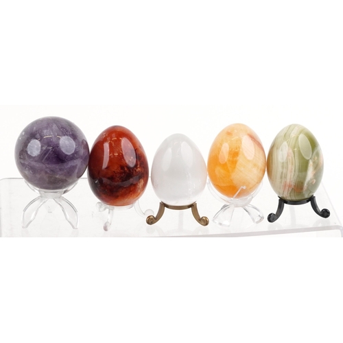 1109 - A large collection of polished stone rock and mineral specimens and marbles including amethyst, rose... 