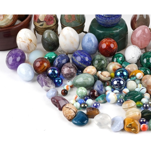 1109 - A large collection of polished stone rock and mineral specimens and marbles including amethyst, rose... 