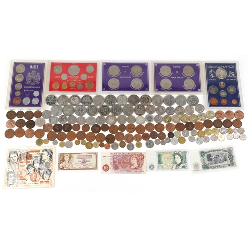 1495A - A quantity of British coinage to include six proof sets, eight five pound coins, six two pound coins... 