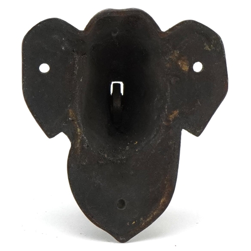 409 - A late Victorian cast bronze door knocker in the form of an Elephant, H-9cm.