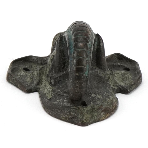 409 - A late Victorian cast bronze door knocker in the form of an Elephant, H-9cm.