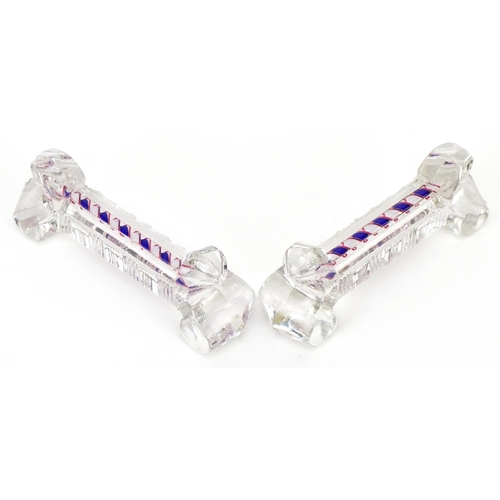 275 - A rare pair of cut glass & candle twist knife rests, probably St. Cloud, the candle twist in pink, w... 