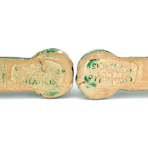 364 - A pair of 'poodle' knife rests, circa 1950, each green glazed elongated hound stamped Denys Chiapell... 