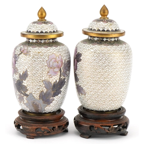 1195 - A pair of Japanese cloisonné diminutive vases and covers, 20th century, raised on wooden bases, over... 