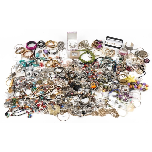 3803 - A large collection of vintage and later costume jewellery including necklaces, bangles, earrings and... 