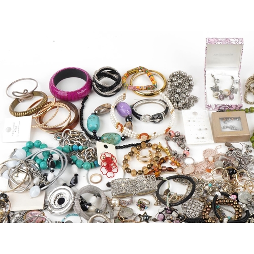 3803 - A large collection of vintage and later costume jewellery including necklaces, bangles, earrings and... 