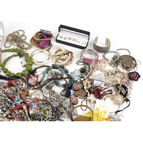 3803 - A large collection of vintage and later costume jewellery including necklaces, bangles, earrings and... 