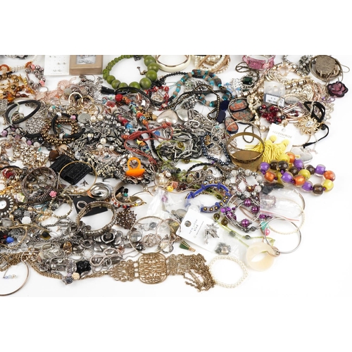 3803 - A large collection of vintage and later costume jewellery including necklaces, bangles, earrings and... 