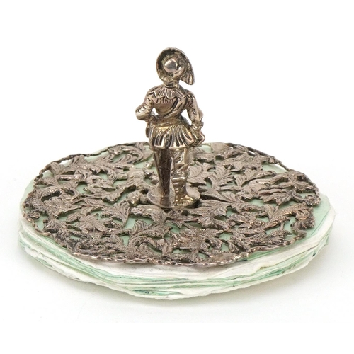 87 - William Comyns, a Victorian silver pen wipe in the form of a Cavalier, the base pierced with Putti a... 