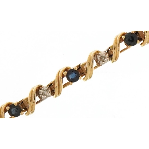 3029 - 10ct gold sapphire and diamond line bracelet.