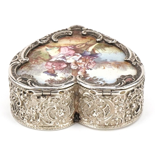 127 - A continental .900 grade silver enamelled box and cover, the hinged lid hand painted with figures se... 