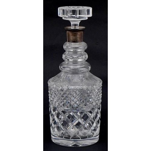 1192 - A good quality cut crystal decanter with silver collar by Israel Freeman & Son Ltd., 28cm high.