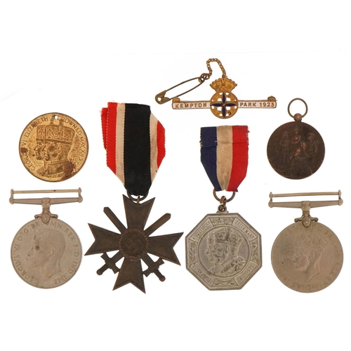 2410 - Militaria including a German military interest War Merit design cross with swords, British military ... 