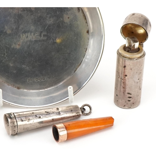 574 - Edwardian and later silver objects including a scent bottle, cheroot holder case housing an amber ch... 