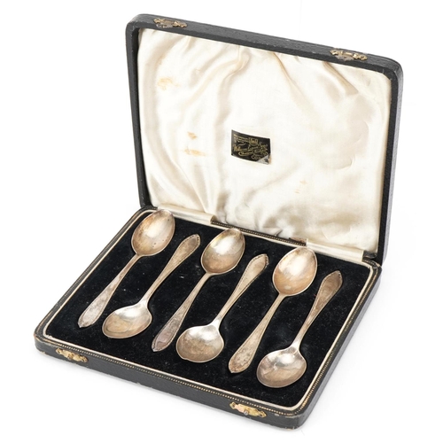 553 - A set of six silver teaspoons, Birmingham 1940, 11.5cm in length, 78.2g, housed in a velvet and silk... 