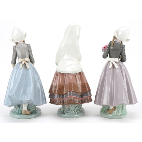 471 - Three Lladro figurines - Festival Time 5053, Dutch Girl with Goose 5066 and Dutch Girl with flowers ... 