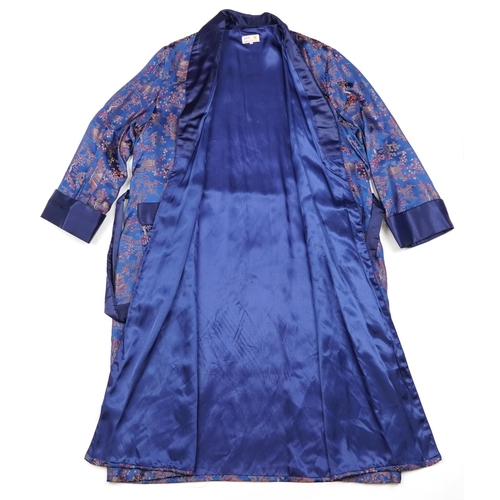 256 - A Chinese blue silk embroidered dressing gown, 20th century, 110cm in length.