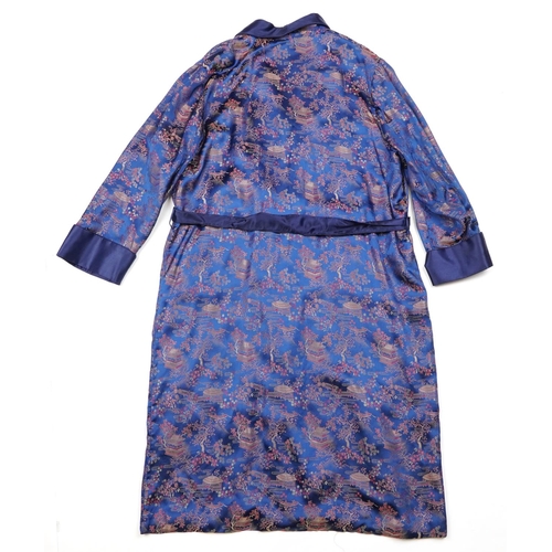 256 - A Chinese blue silk embroidered dressing gown, 20th century, 110cm in length.