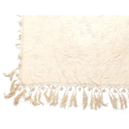 1013 - A Chinese Beige Crepe Silk & Worked Tablecover, circa 1910, woven with a tasselled and crocheted bor... 