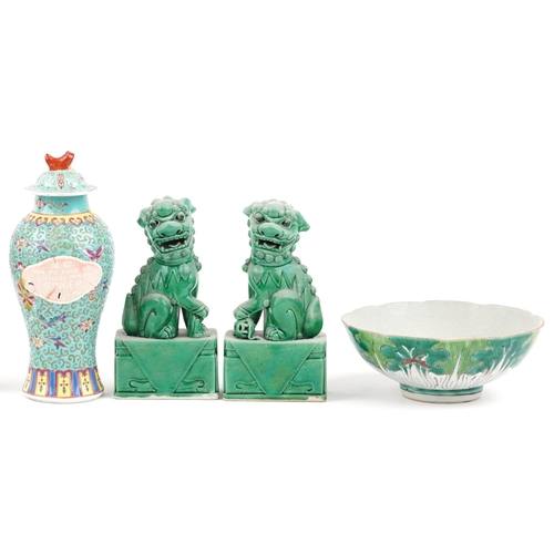 1104 - A small group of Chinese porcelain items, all 20th century, including a pair of green glazed Foo dog... 