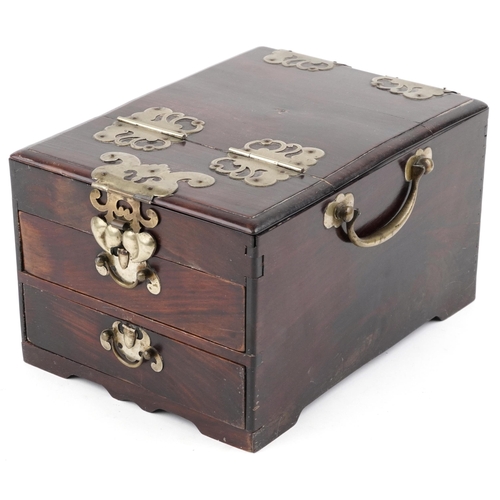 177 - A Chinese softwood and metal bound dressing table box, early 20th century, the hinged lid revealing ... 