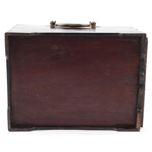 177 - A Chinese softwood and metal bound dressing table box, early 20th century, the hinged lid revealing ... 