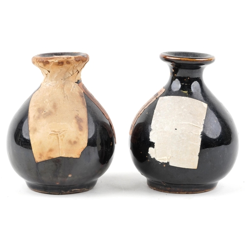 414 - A Wing Lee Wai, Hong Kong prohibition liquor ceramic bottle, 9cm high, together with a similar Kae F... 